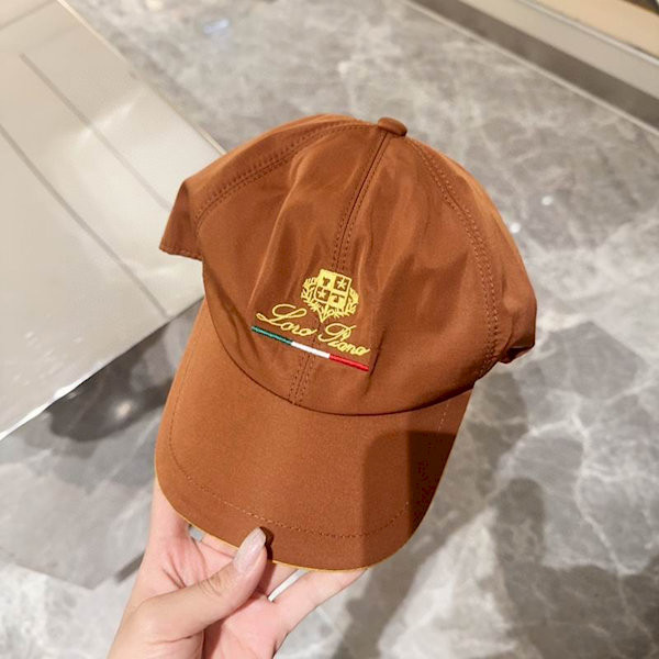 Loro Piana Baseball Cap with Elasticated back Microfibre Storm System in caramel brown and yellow