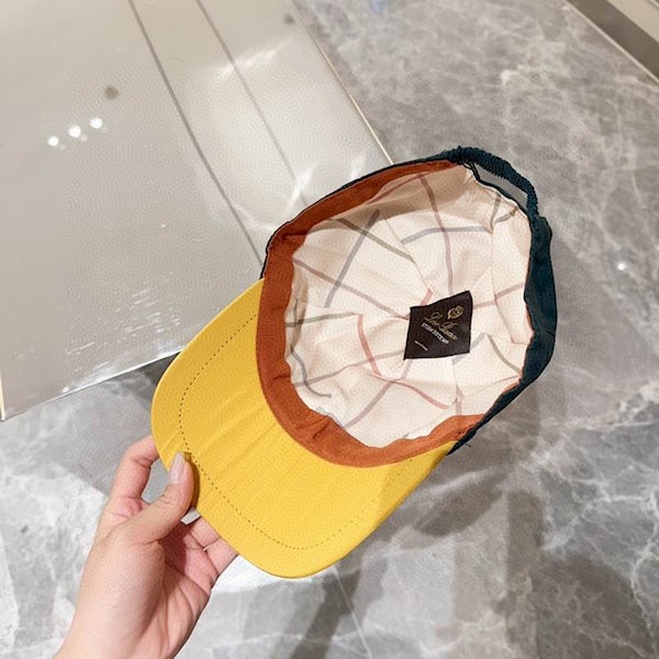 Loro Piana Baseball Cap with Elasticated back Microfibre Storm System in dark green and yellow