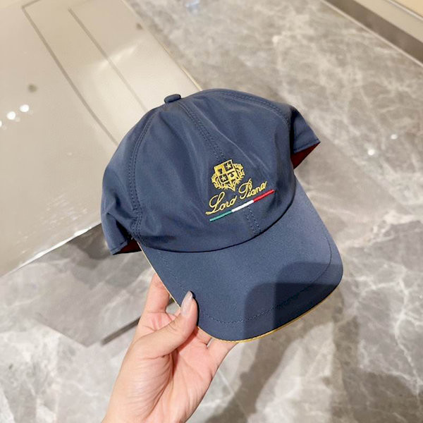 Loro Piana Baseball Cap with Elasticated back Microfibre Storm System in dusty blue and yellow
