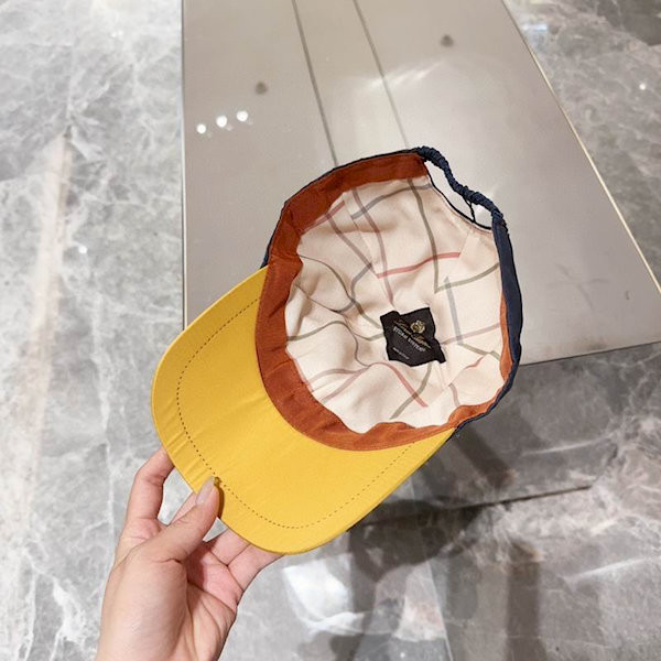 Loro Piana Baseball Cap with Elasticated back Microfibre Storm System in dusty blue and yellow