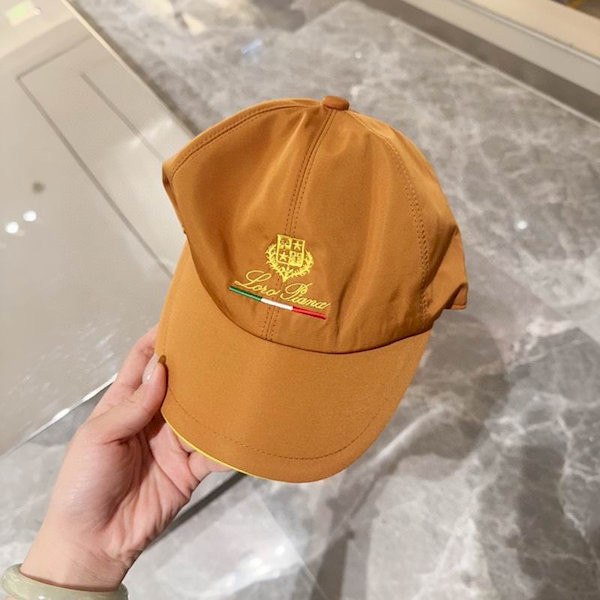 Loro Piana Baseball Cap with Elasticated back Microfibre Storm System in light brown and yellow