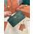 Loro Piana Women's Extra Ostrich Pocket Bag / Peacock Green/Rolled Silver