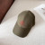 Loro Piana Baseball Cap with Elasticated back Microfibre Storm System in army green and red brown