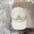 Loro Piana Baseball Cap with Elasticated back Microfibre Storm System in light beige and yellow