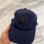 Loro Piana Baseball Cap with Elasticated back Cashmere Storm System in navy blue and dark brown