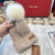 Loro Piana Women's Cashmere Beanie with Pom-Pom in beige